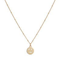 Gold vermeil pendant Necklace with a sad face emoji design